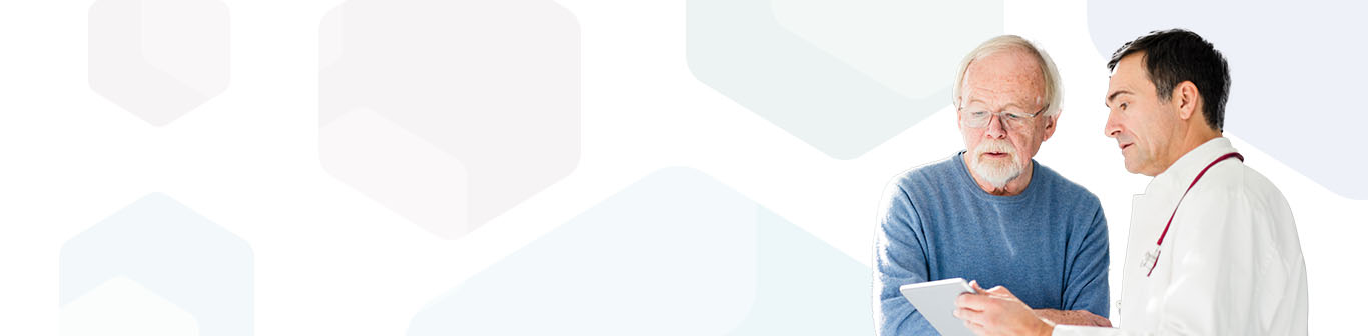 A man living with cholangiocarcinoma is discussing biomarker testing with his oncologist.